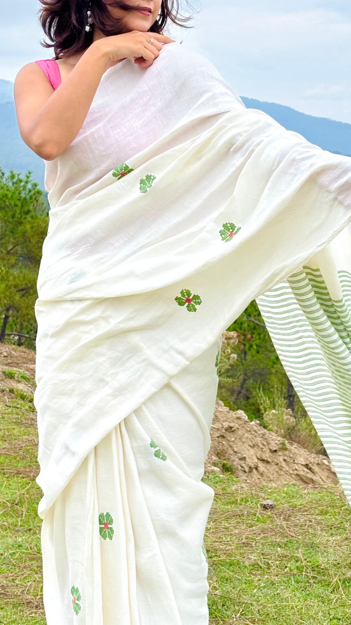 Handwoven Linen and Organic Cotton Blend Off-White Saree with Green Floral Motifs and Striped Pallu