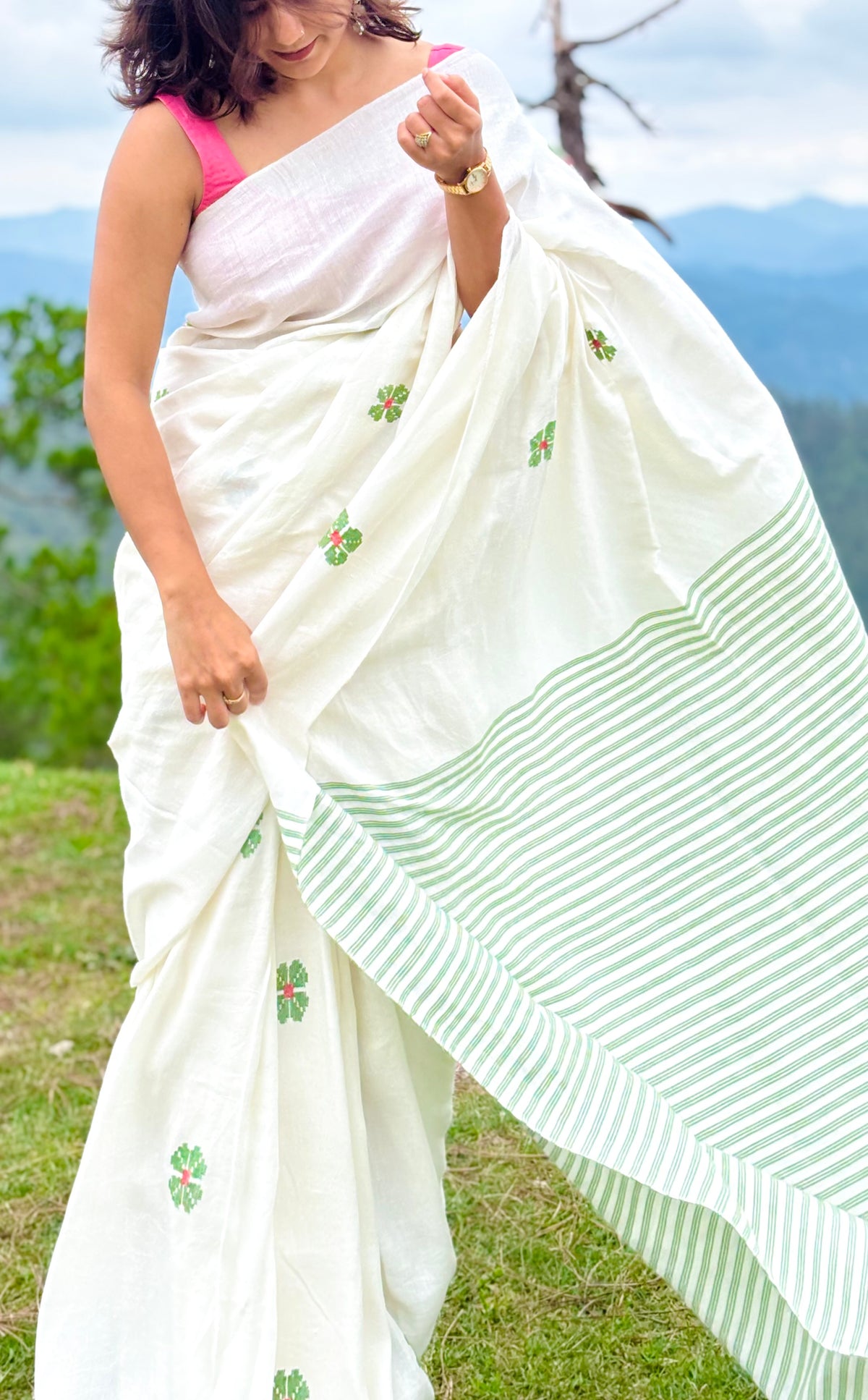 Handwoven Linen and Organic Cotton Blend Off-White Saree with Green Floral Motifs and Striped Pallu