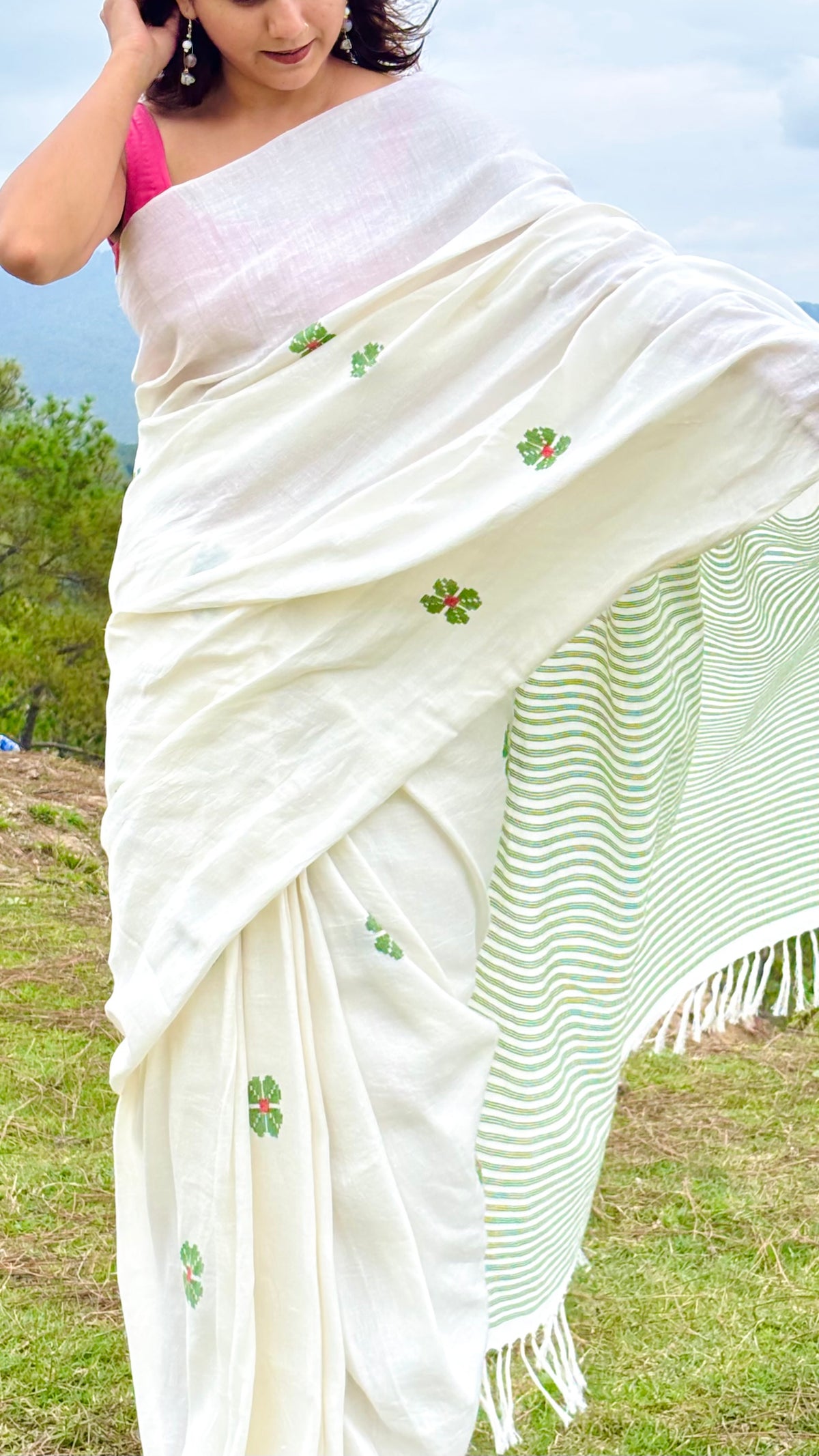 Handwoven Linen and Organic Cotton Blend Off-White Saree with Green Floral Motifs and Striped Pallu