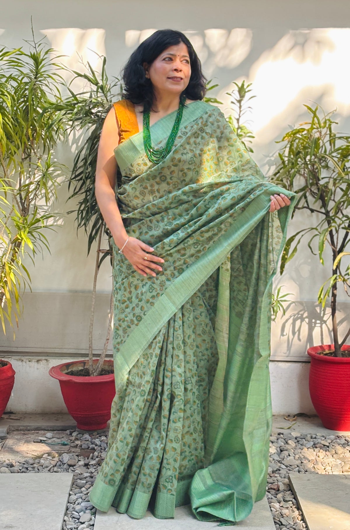 Handloom Sage Green Silk Saree with Floral Motifs, Striped Pallu and Tassels