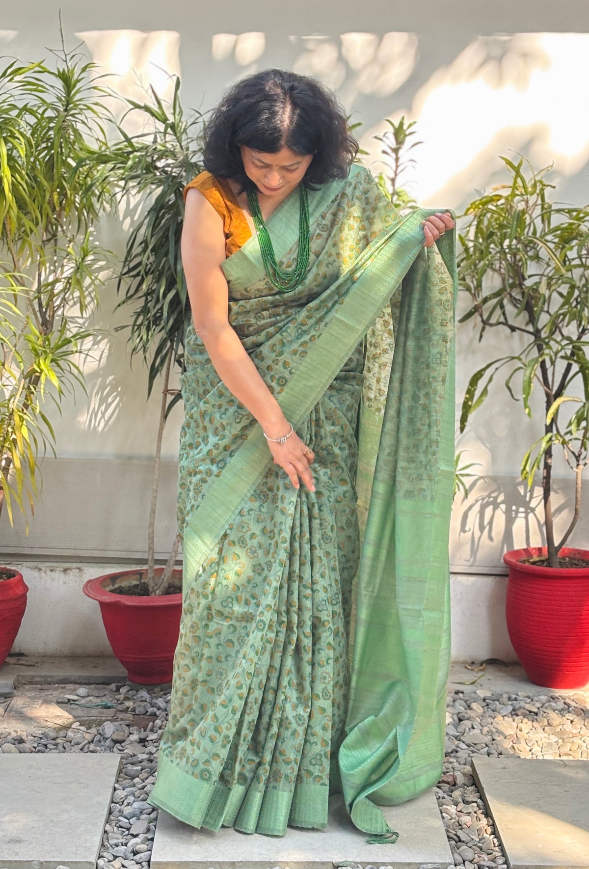 Handloom Sage Green Silk Saree with Floral Motifs, Striped Pallu and Tassels