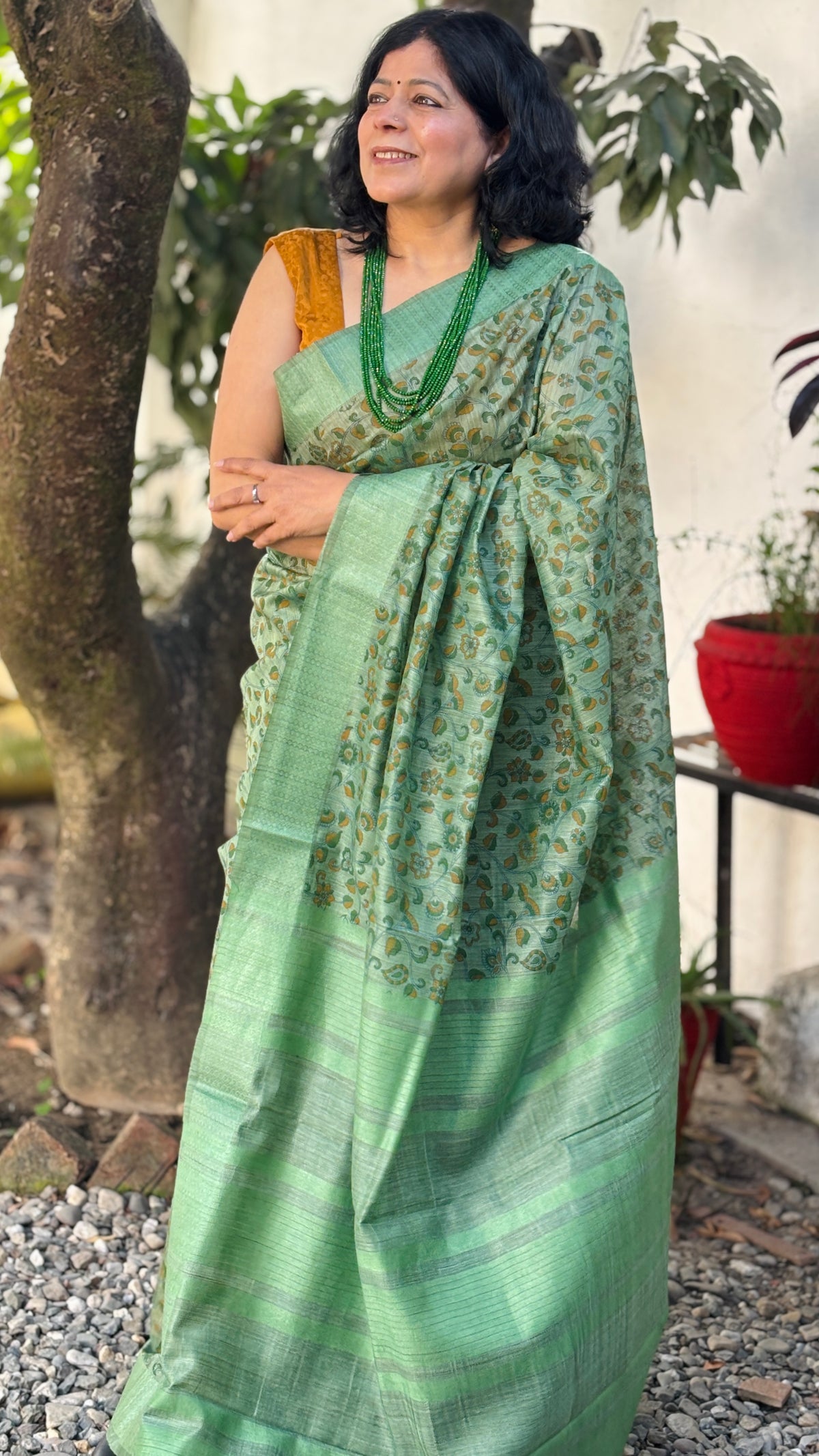 Handloom Sage Green Silk Saree with Floral Motifs, Striped Pallu and Tassels