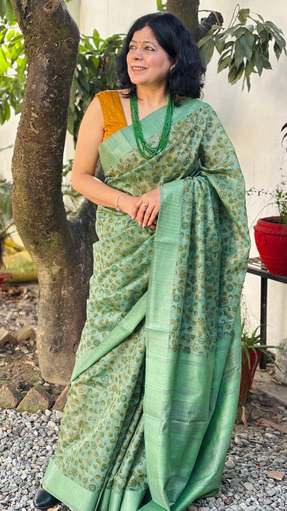 Handloom Sage Green Silk Saree with Floral Motifs, Striped Pallu and Tassels