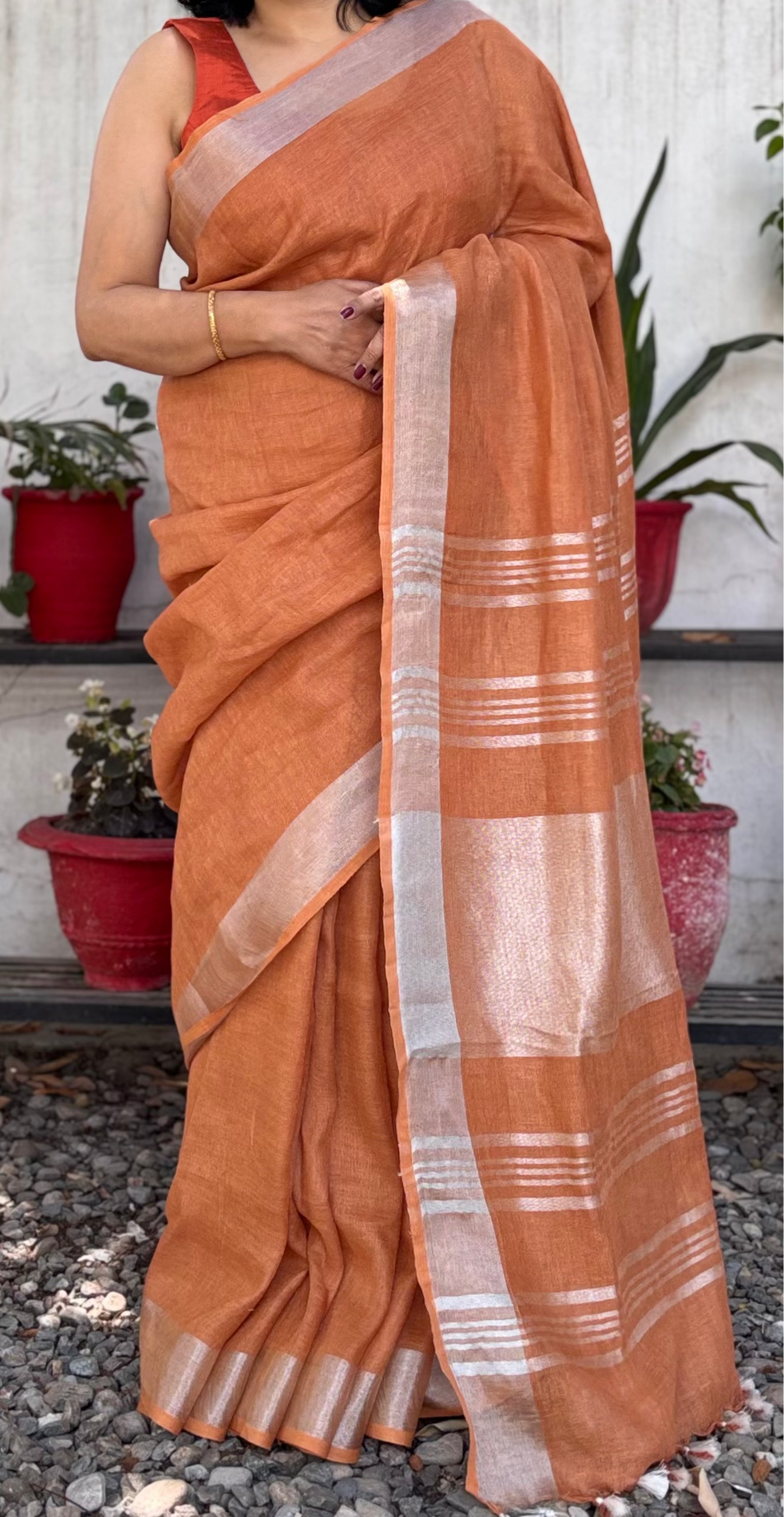 Handwoven Pure Linen Rust Saree with Bronze & Silver Woven Border, Striped Pallu and Dual-Coloured Tassels