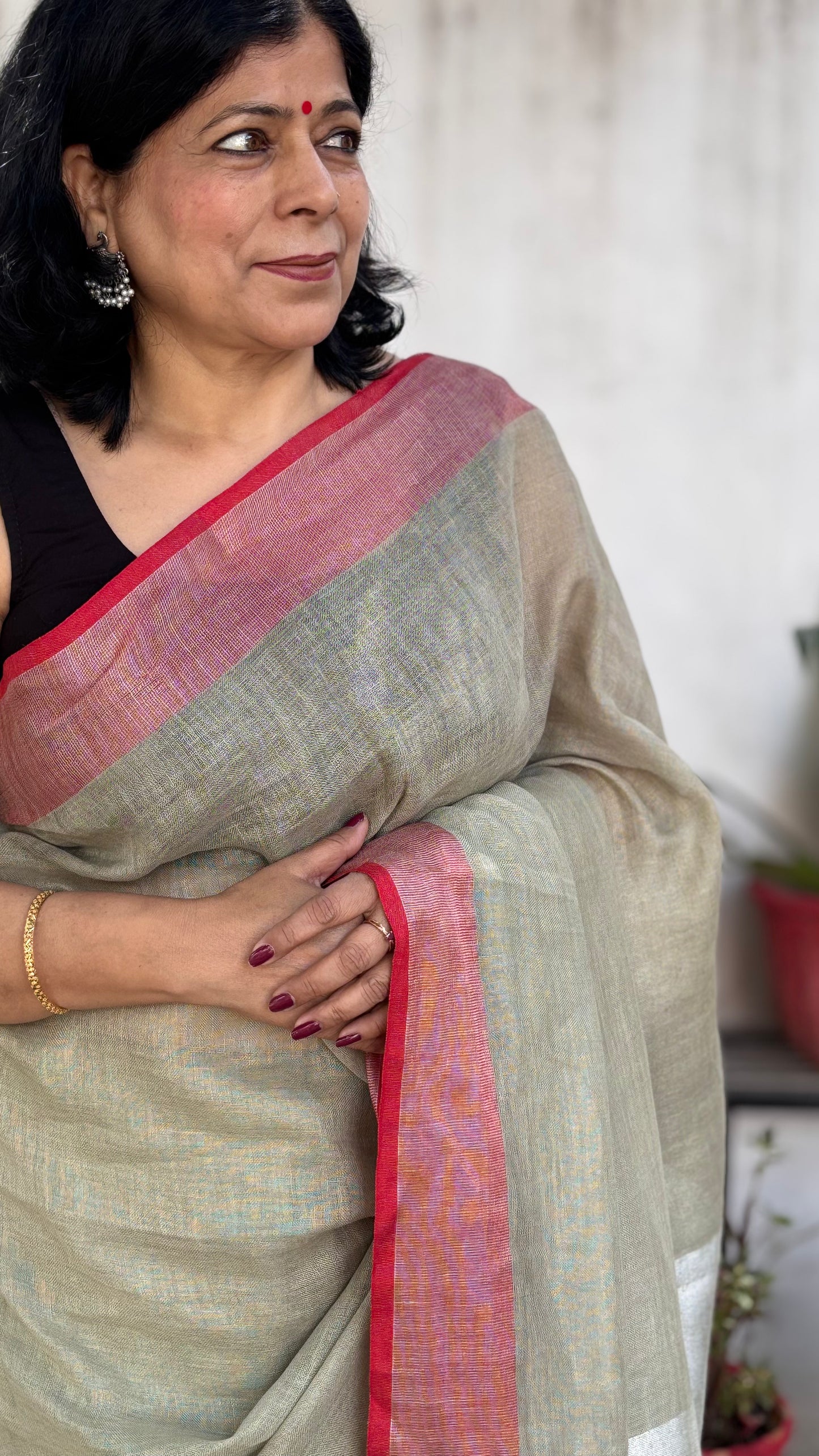 Handwoven Pure Linen Sage Green Saree with Red Woven Border, Statement Pallu and Dual-Coloured Tassels