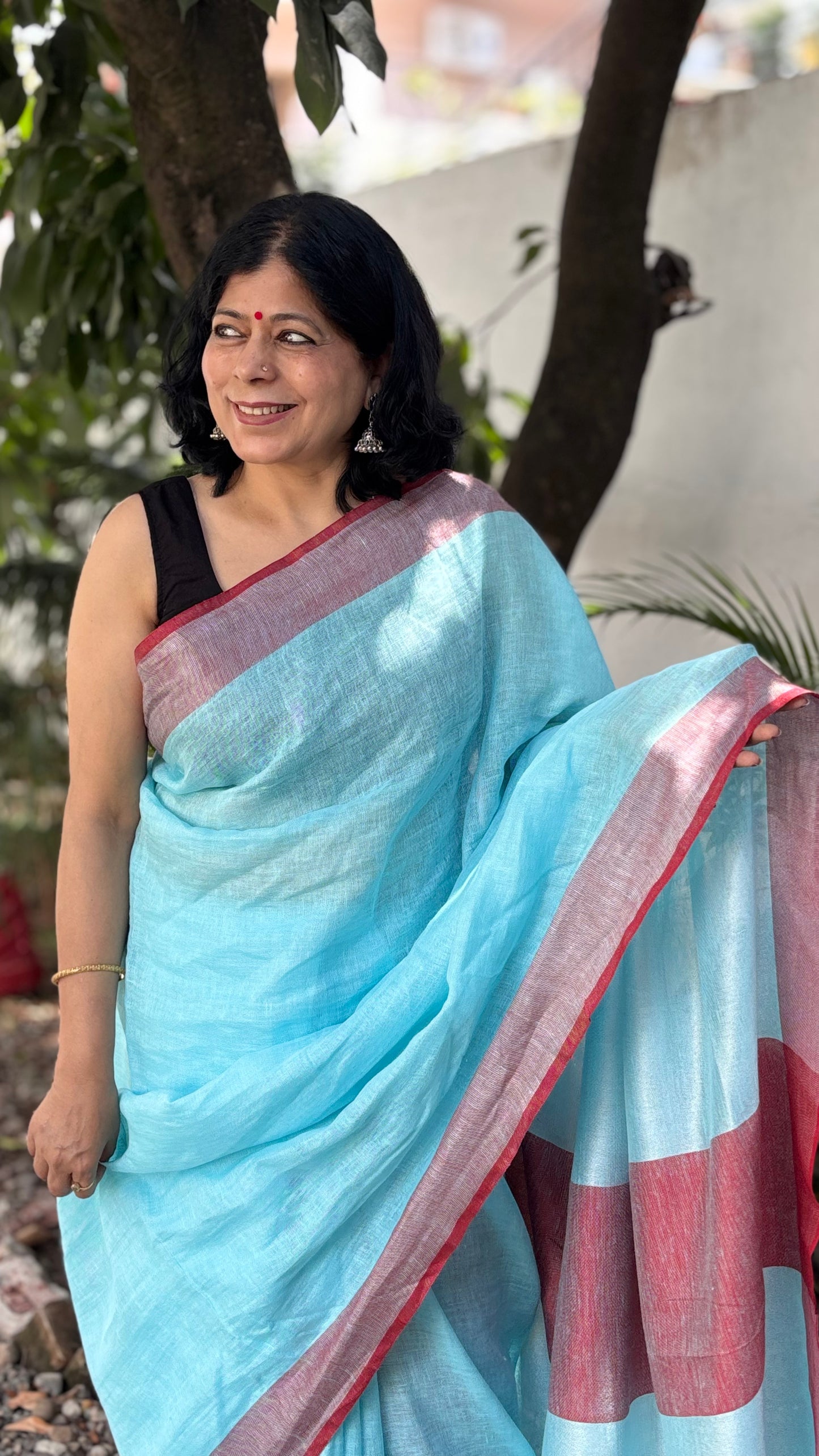 Handwoven Pure Linen Sky Blue Saree with Red Border, Statement Pallu and Red Tassels