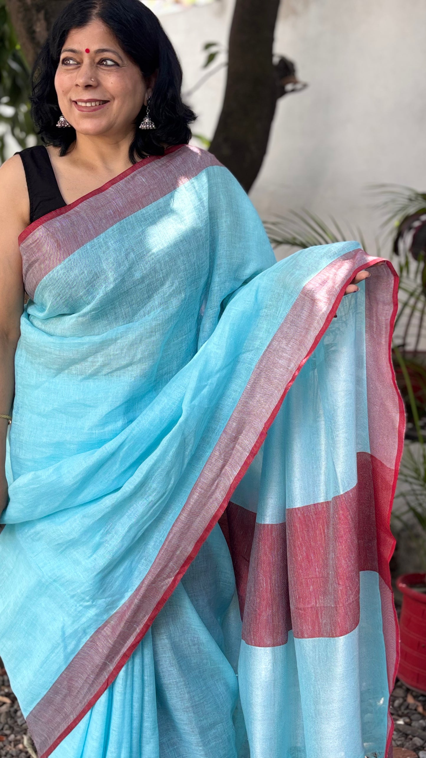 Handwoven Pure Linen Sky Blue Saree with Red Border, Statement Pallu and Red Tassels